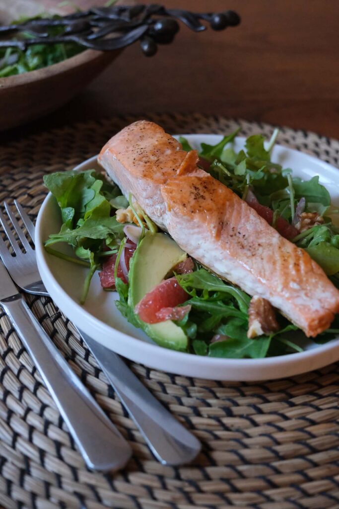 Place setting for Salmon Salad with Walnuts and Grapefruit