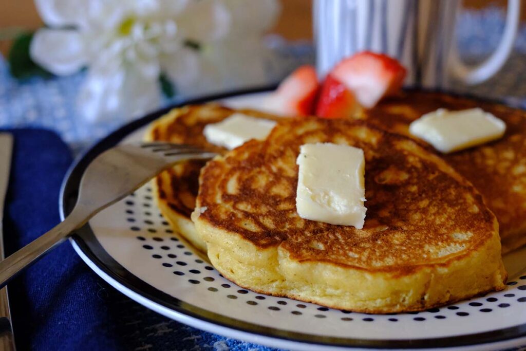 Plate of Cornmeal Pancakes with butter