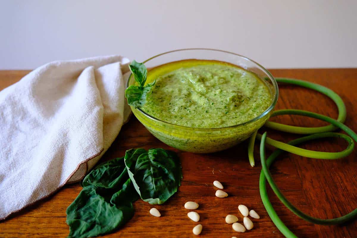 Garlic Scape Pesto Recipe with fresh basil, pine nuts and garlic scapes