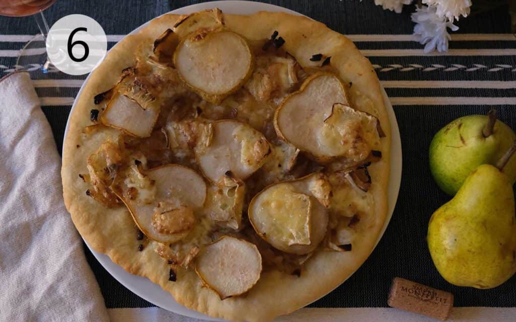 Instructions to make this pear pizza recipe - step six a picture of the baked pear pizza ready to eat