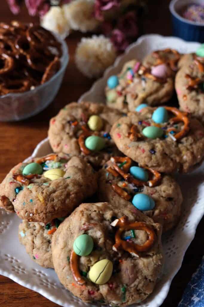 Easter cookies with mini eggs and pretzels on a plate