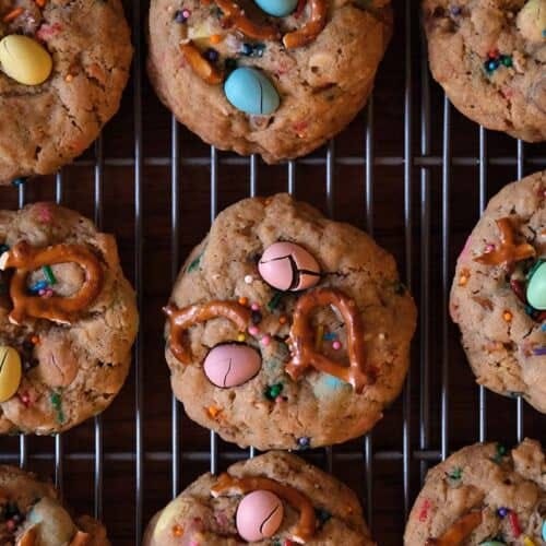Wire rack of cadbury mini egg cookies cooling.