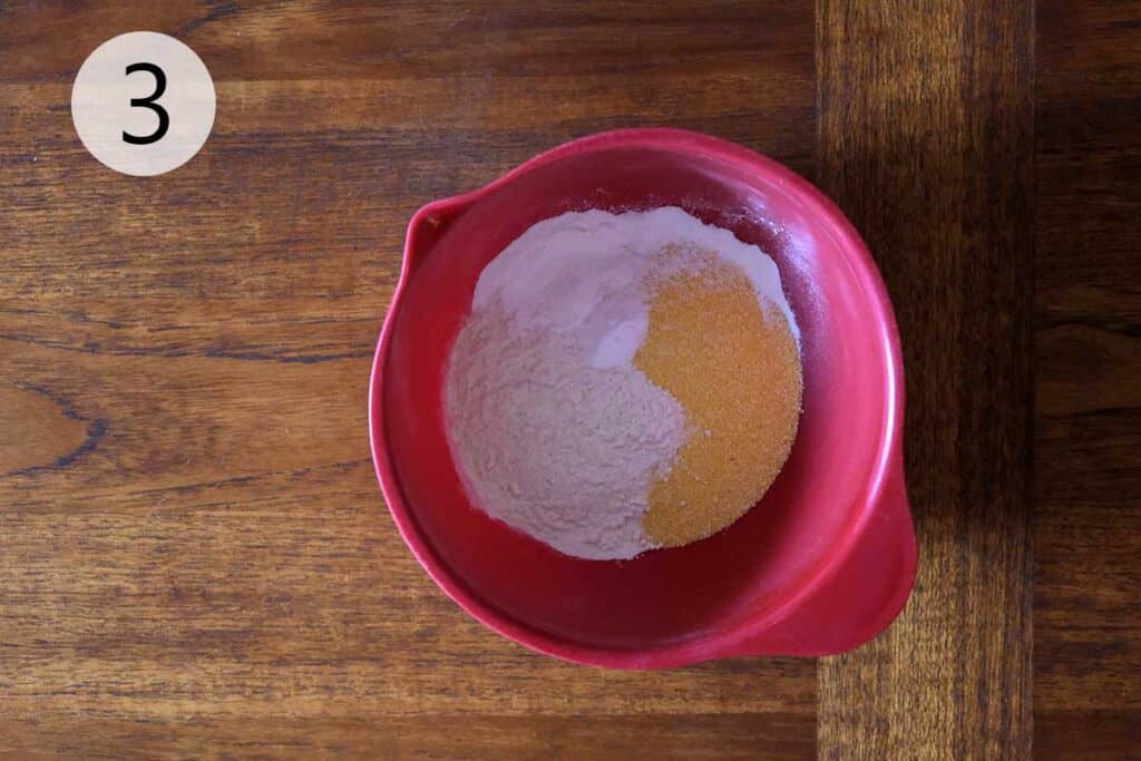 Cornmeal, flour, baking powder, baking soda, and salt whisked together for skillet cornbread