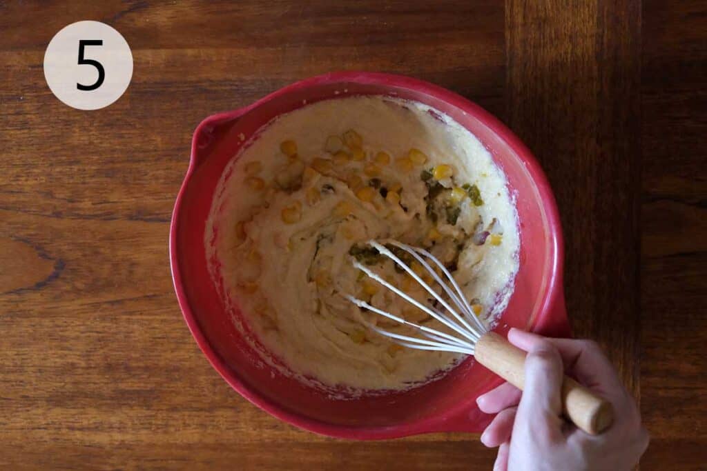 Corn kernels and chopped jalapeños folded into cornbread batter